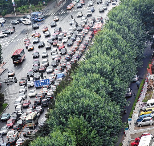 长春交通流超饱和将限行，升级信号系统并恢复停车场功能